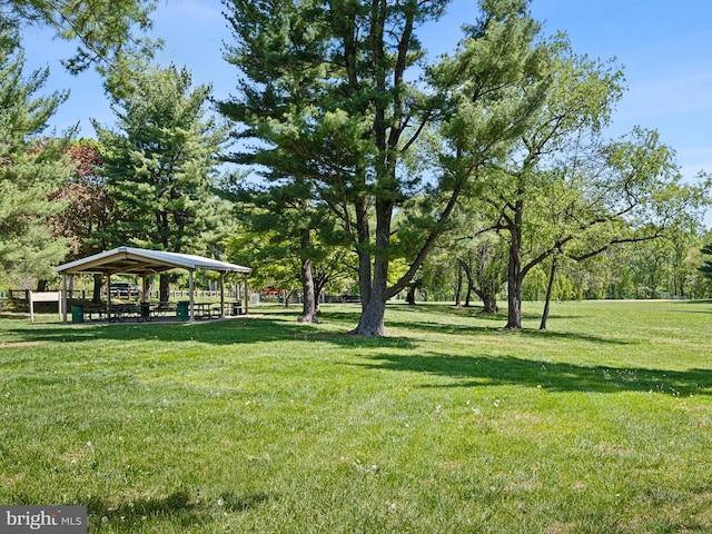 surrounding community featuring a yard and a gazebo