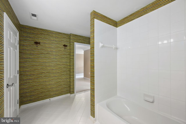 full bath with tub / shower combination, baseboards, tile patterned flooring, and wallpapered walls