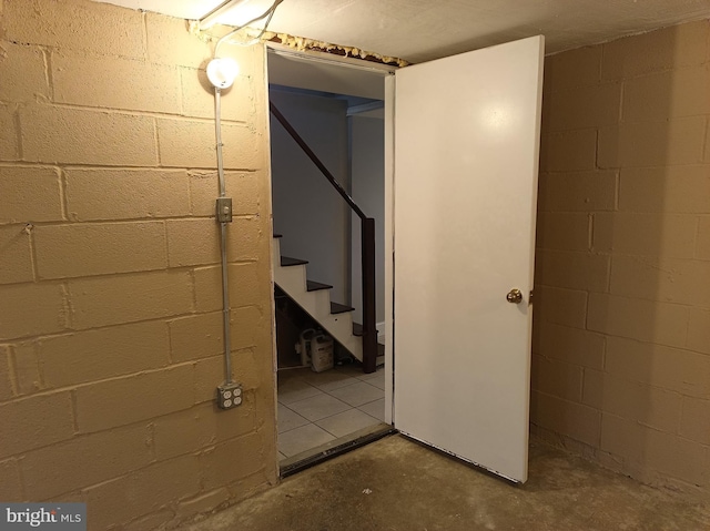 finished basement featuring stairway