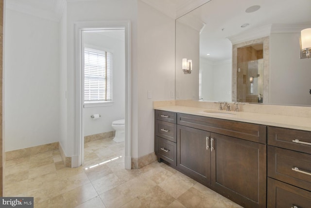 full bathroom with baseboards, ornamental molding, toilet, and vanity