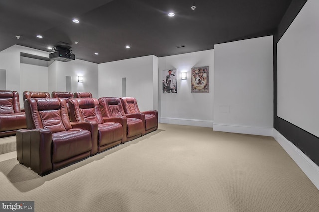 cinema with light carpet, baseboards, visible vents, and recessed lighting