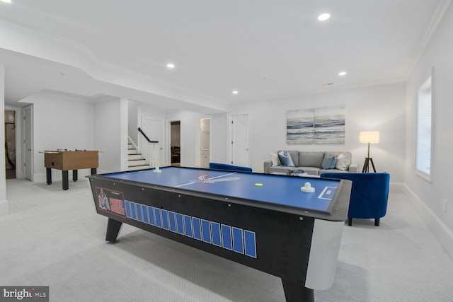 game room with ornamental molding, light carpet, baseboards, and recessed lighting