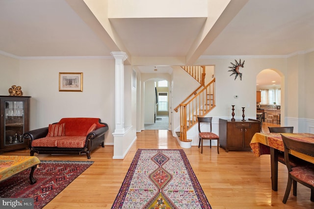 16647 Space More Cir, Woodbridge, VA 22191 - foyer entrance featuring arched walkways, light wood-type flooring, stairway, plenty of natural light, and crown molding