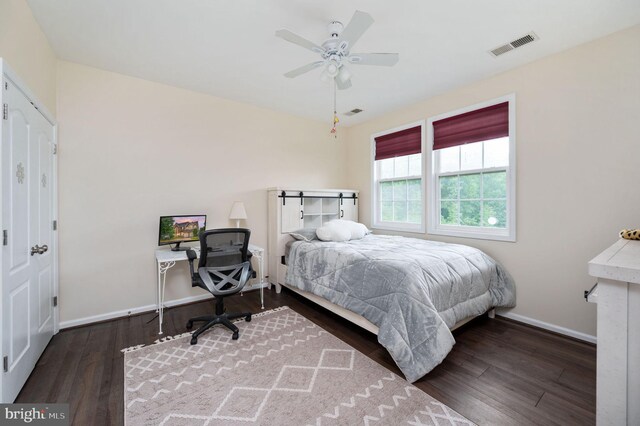16647 Space More Cir, Woodbridge, VA 22191 - bedroom featuring wood finished floors, baseboards, and a ceiling fan