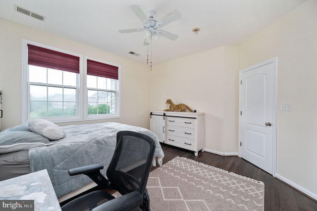 16647 Space More Cir, Woodbridge, VA 22191 - bedroom featuring dark wood-type flooring, baseboards, and ceiling fan