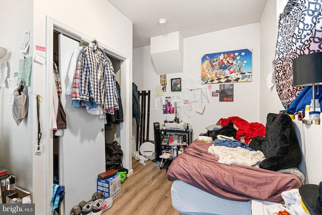 bedroom featuring wood finished floors