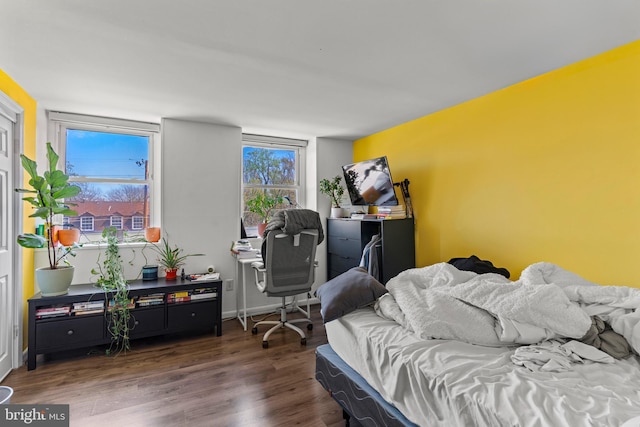 1854 Dutch Village Dr Unit R-270, Hyattsville, MD 20785 - bedroom with baseboards and wood finished floors