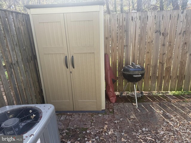 1854 Dutch Village Dr Unit R-270, Hyattsville, MD 20785 - view of shed with central AC unit and fence
