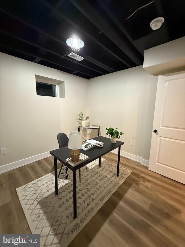1198 Glenside Rd, Downingtown, PA 19335 - home office featuring wood finished floors, baseboards, and visible vents