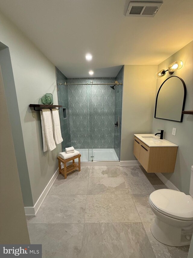 1198 Glenside Rd, Downingtown, PA 19335 - full bathroom featuring vanity, baseboards, a stall shower, toilet, and visible vents