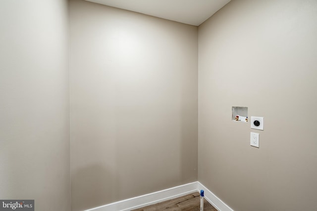 1198 Glenside Rd, Downingtown, PA 19335 - washroom with laundry area, wood finished floors, hookup for an electric dryer, washer hookup, and baseboards