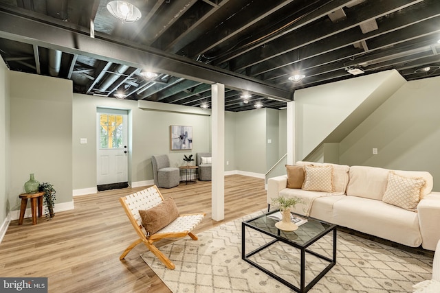1198 Glenside Rd, Downingtown, PA 19335 - living area featuring wood finished floors, baseboards, and stairs