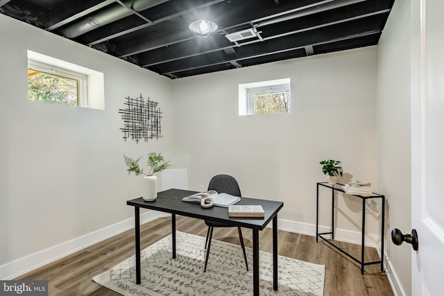 1198 Glenside Rd, Downingtown, PA 19335 - office area with wood finished floors, baseboards, and a wealth of natural light