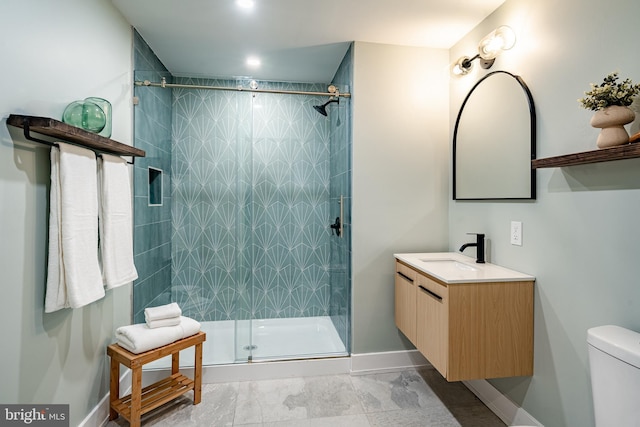 1198 Glenside Rd, Downingtown, PA 19335 - full bathroom featuring toilet, a tile shower, vanity, and baseboards
