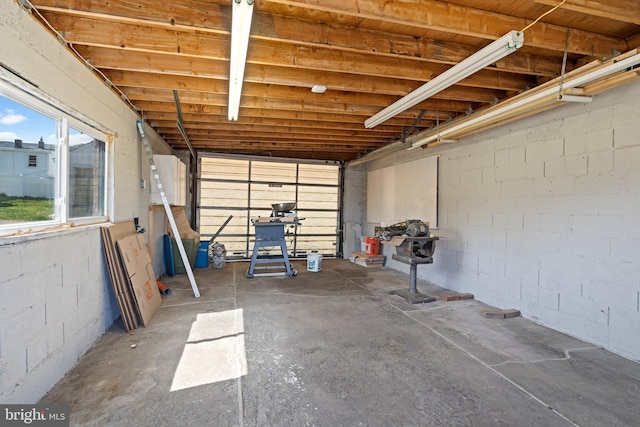garage featuring concrete block wall