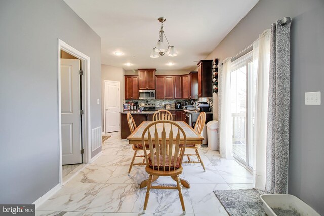 1634 Cape May Rd, Essex, MD 21221 - dining area featuring recessed lighting, visible vents, marble finish floor, and baseboards