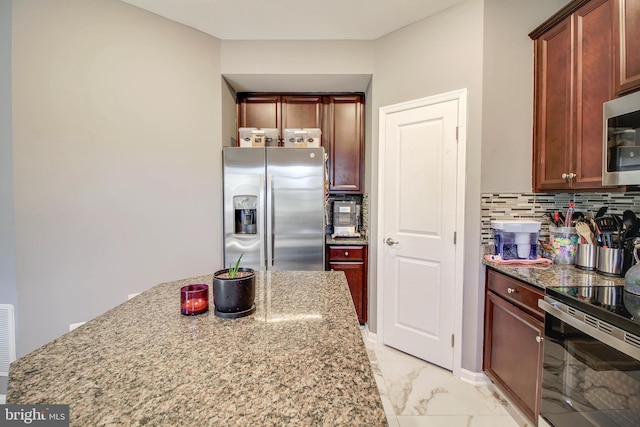 1634 Cape May Rd, Essex, MD 21221 - kitchen with visible vents, marble finish floor, stainless steel appliances, decorative backsplash, and light stone countertops