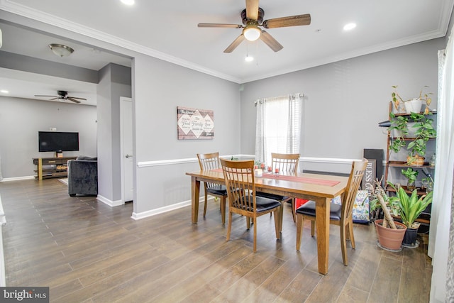 1634 Cape May Rd, Essex, MD 21221 - dining room with ornamental molding, wood finished floors, baseboards, and ceiling fan