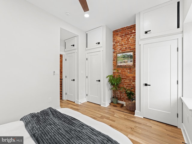 1611 N Dover St, Philadelphia, PA 19121 - bedroom featuring baseboards, brick wall, recessed lighting, ceiling fan, and light wood-type flooring