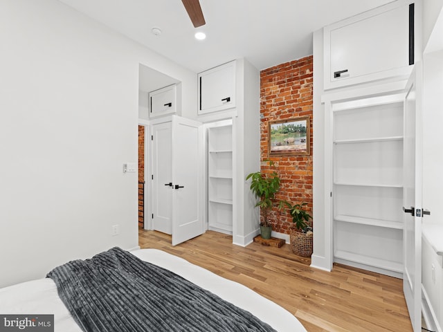 1611 N Dover St, Philadelphia, PA 19121 - bedroom with light wood-style flooring, recessed lighting, brick wall, baseboards, and ceiling fan