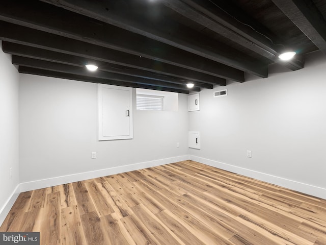 1611 N Dover St, Philadelphia, PA 19121 - finished basement featuring wood finished floors, baseboards, and visible vents