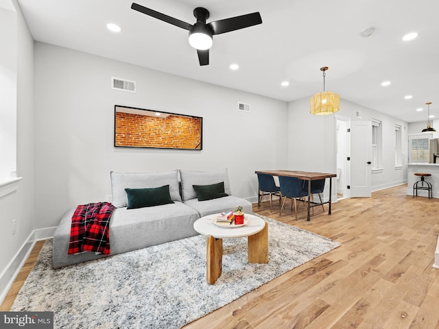 1611 N Dover St, Philadelphia, PA 19121 - living room with recessed lighting, visible vents, and wood finished floors