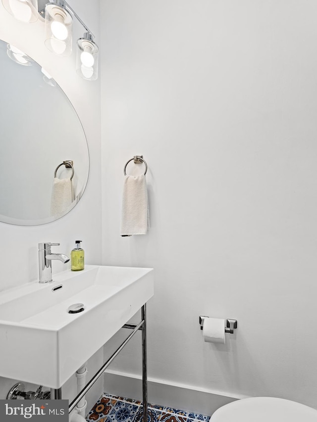 1611 N Dover St, Philadelphia, PA 19121 - half bath featuring a sink and toilet