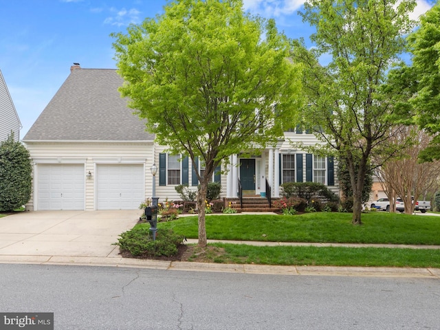 view of property hidden behind natural elements with a garage, concrete driveway, a front lawn, and a shingled roof