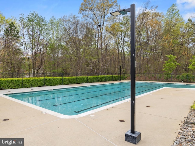 community pool with fence
