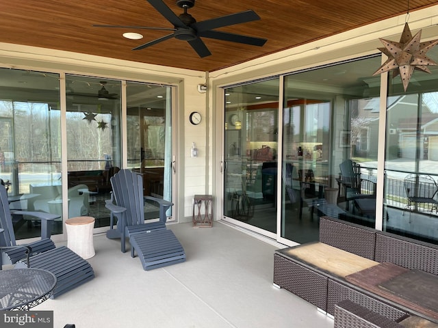 view of patio / terrace featuring ceiling fan