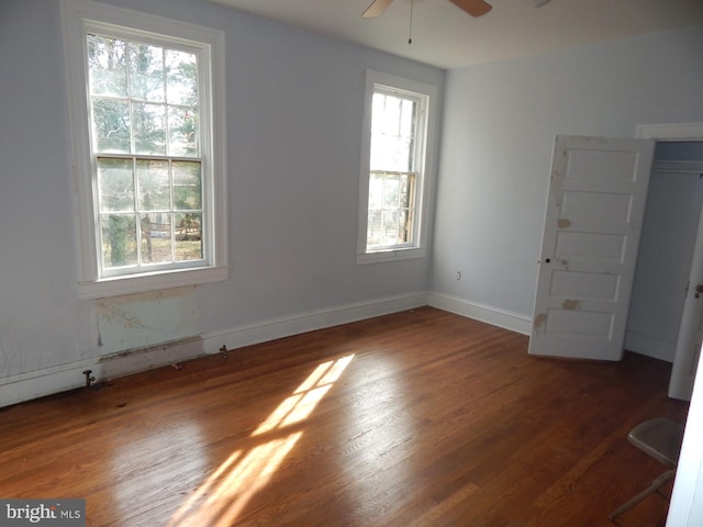 605 Upland Rd, Pikesville, MD 21208 - spare room featuring baseboards, wood finished floors, and a ceiling fan