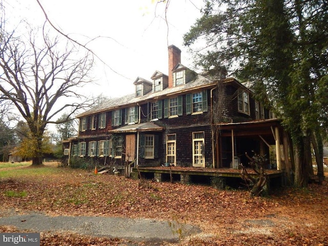 605 Upland Rd, Pikesville, MD 21208 - back of house featuring a chimney