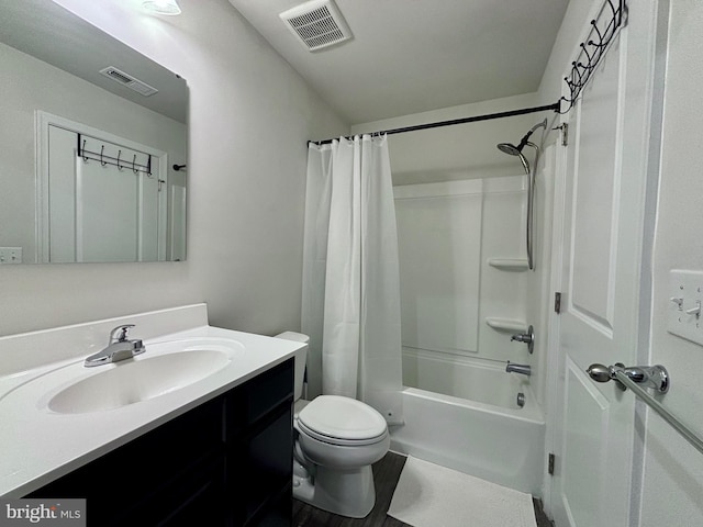 17692 Fieldstone Ave, Milford, DE 19963 - full bathroom with visible vents, toilet, vanity, and shower / bathtub combination with curtain