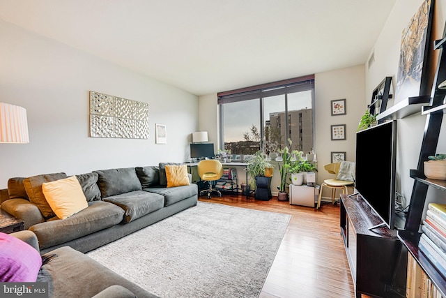 440 L St NW Unit 513, Washington, DC 20001 - living room featuring visible vents and wood finished floors