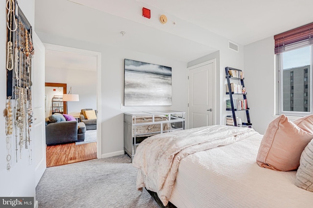 440 L St NW Unit 513, Washington, DC 20001 - carpeted bedroom featuring baseboards and visible vents