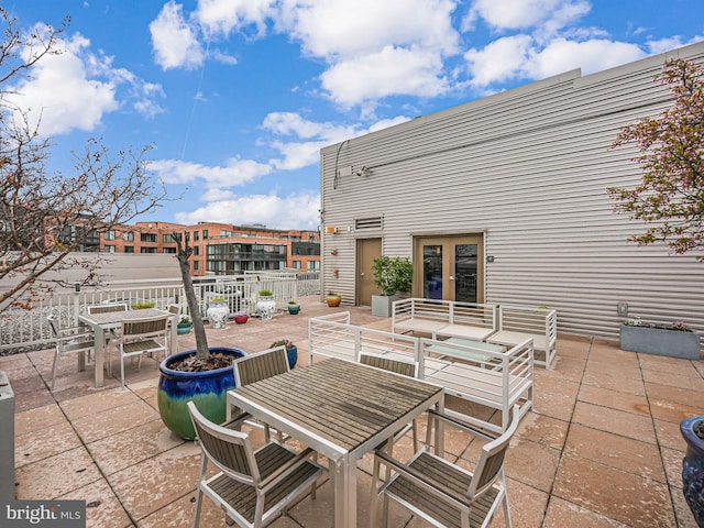 440 L St NW Unit 513, Washington, DC 20001 - view of patio / terrace with french doors and outdoor dining space