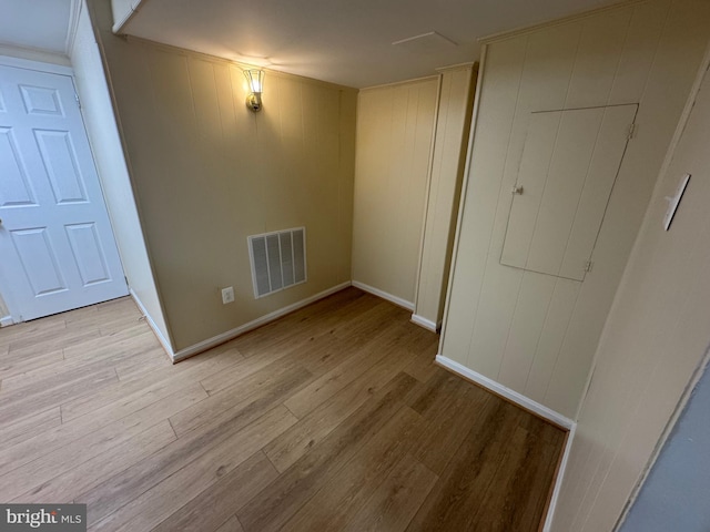 1636 Fort Davis Pl SE, Washington, DC 20020 - unfurnished room with light wood-style floors and baseboards