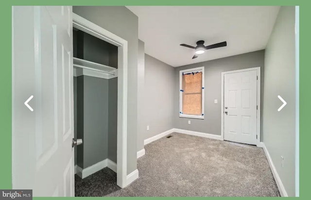 unfurnished bedroom with baseboards and carpet