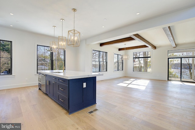 2762A Bon Haven Ln, Annapolis, MD 21401 - kitchen featuring a sink, visible vents, baseboards, and a notable chandelier