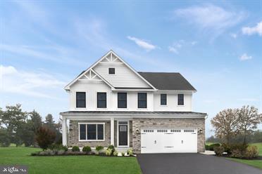 view of front facade with a front lawn, an attached garage, and aphalt driveway