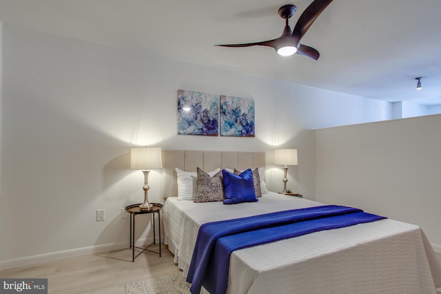 811 4th St NW Unit 608, Washington, DC 20001 - bedroom with wood finished floors, ceiling fan, and baseboards
