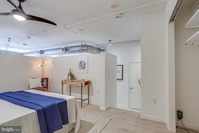 811 4th St NW Unit 608, Washington, DC 20001 - bedroom featuring baseboards, ceiling fan, and wood finished floors