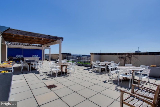 811 4th St NW Unit 608, Washington, DC 20001 - view of patio featuring outdoor dining space, a pergola, and grilling area