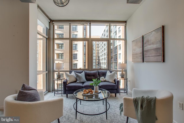 811 4th St NW Unit 608, Washington, DC 20001 - carpeted living room with floor to ceiling windows and baseboards