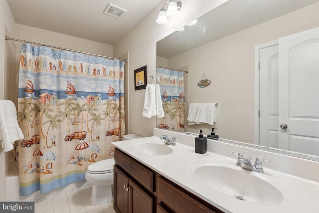 full bathroom featuring visible vents, a sink, tile patterned floors, and toilet