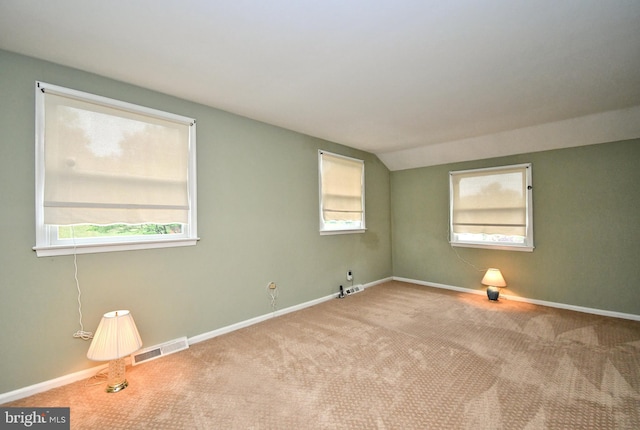 40 Brookside Dr, Holland, PA 18966 - carpeted empty room with baseboards and vaulted ceiling