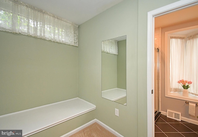 40 Brookside Dr, Holland, PA 18966 - mudroom with baseboards and dark tile patterned floors