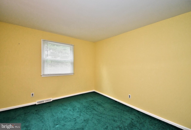 40 Brookside Dr, Holland, PA 18966 - spare room featuring dark colored carpet and baseboards