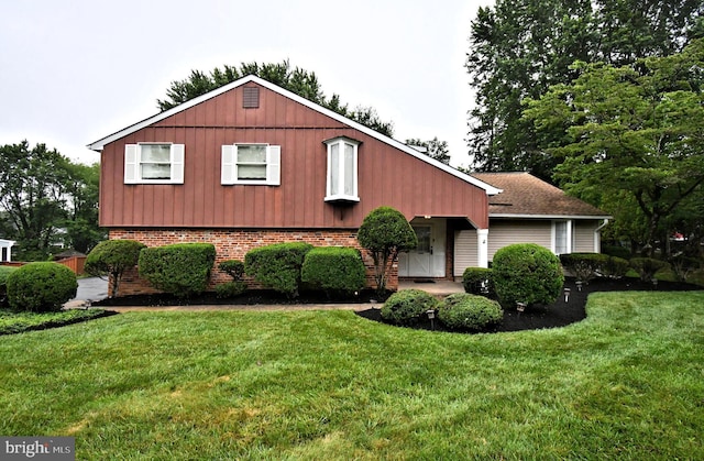 40 Brookside Dr, Holland, PA 18966 - view of front facade with a front lawn and brick siding