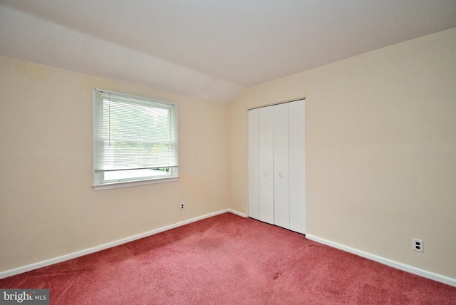 40 Brookside Dr, Holland, PA 18966 - unfurnished bedroom featuring carpet flooring, vaulted ceiling, and a closet